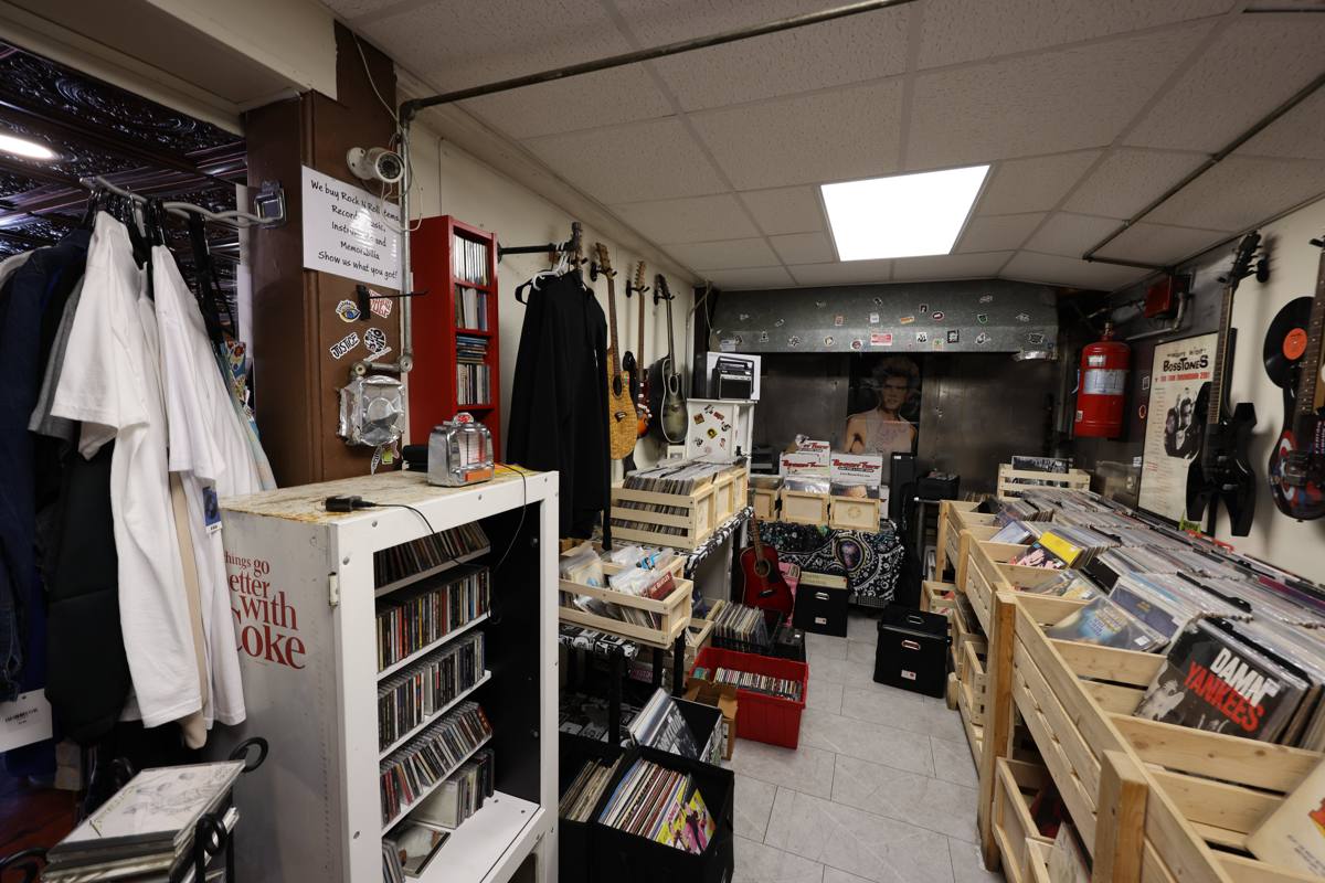 Vinyl record crates and music memorabilia room